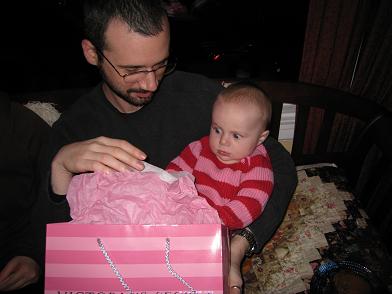 Avery opening presents with Dan