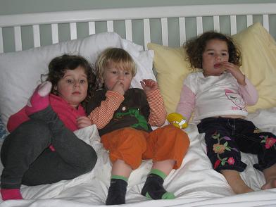 Zoe and friends on bed