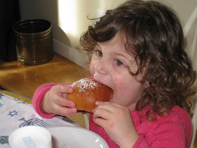 Zoe enjoying jelly donut